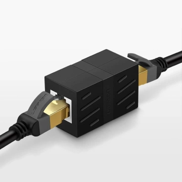 Złączka sieciowa UGREEN  łącznik kabli sieciowych Ethernet RJ45 10 Gbps czarny (NW114 20390)